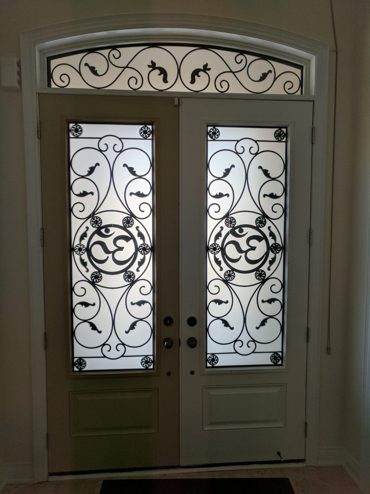 custom door inserts by Randal's Wrought Iron & Stained Glass